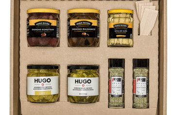 Gewinne 1 von 10 HUGO und Hugo Reitzel Raclette-Sets!